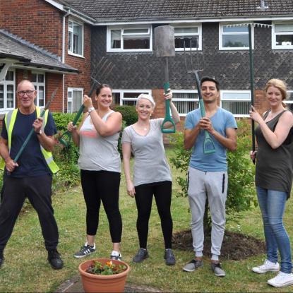 Green fingered housing colleagues dig in for garden makeover